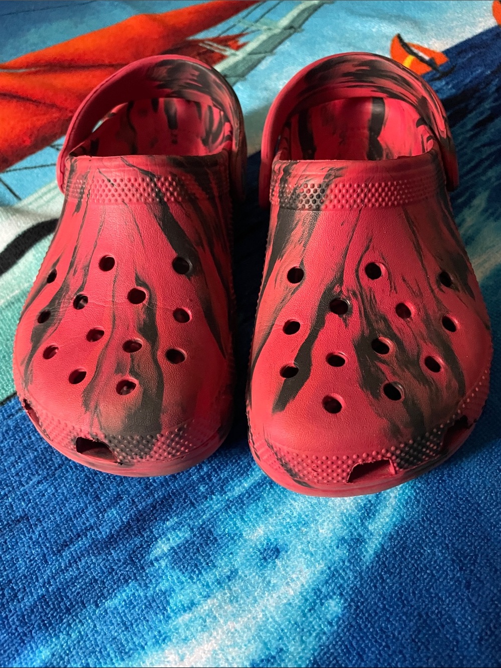 CROCS Kids Red and Black Marble Slip-On Sandals